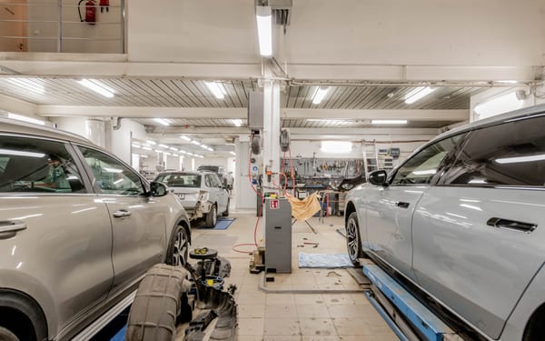 A wide view of a car repair and maintenance workshop