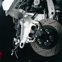 Close-up of a car's disc brake and caliper