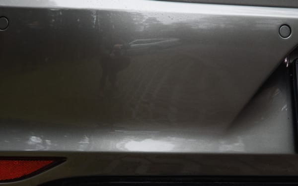 Close-up of a car's dual exhaust pipes
