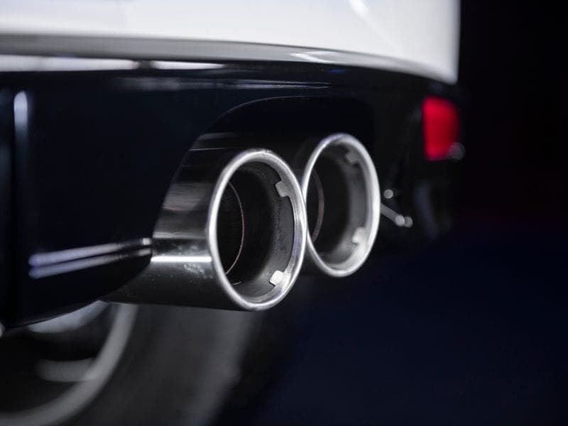 Close-up of a car's dual exhaust tips