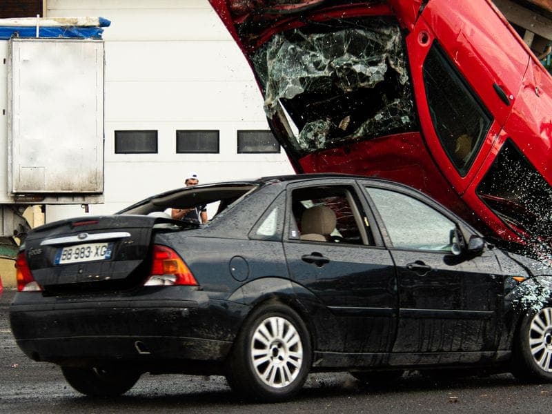 Collision-damaged cars awaiting repair
